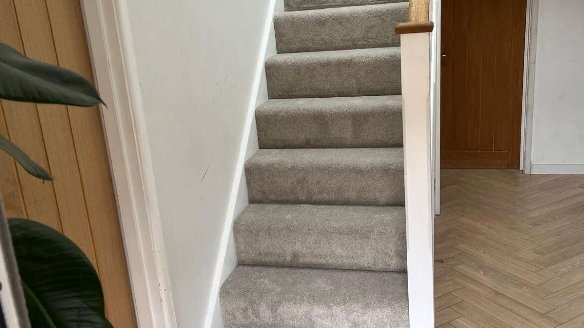 herringbone LVT with carpet on the stairs